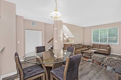 The Dining Area overlooks the Living Room.