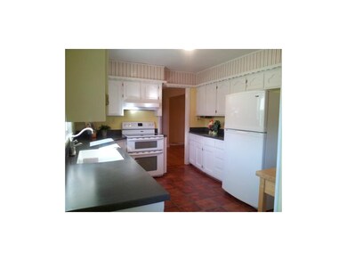 Kitchen: ceramic tile floor, double oven flat top 
