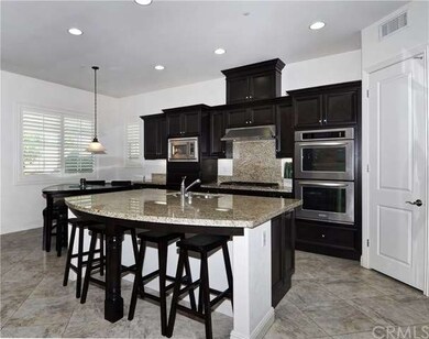 The kitchen in the home is extraordinary and you will be in love with home spacious the kitchen is. As you enter into this kitchen you will feel as if youâ€™ve walked into a chefâ€™s personal kitchen. The oversized granite island is captivating.