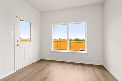 Entryway featuring light wood-type flooring and healthy amount of natural light