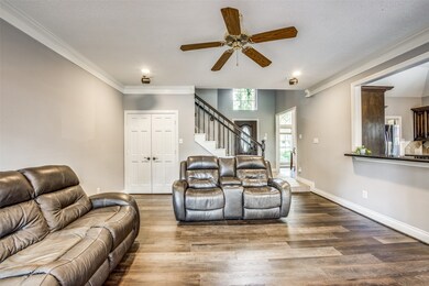Living room w/ entry door view
