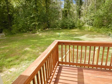 View of backyard from back door landing