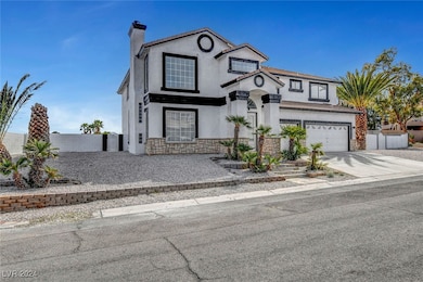 View of front facade with stucco siding, fence, st