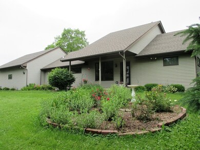Front of Home overlooking Flower Bed