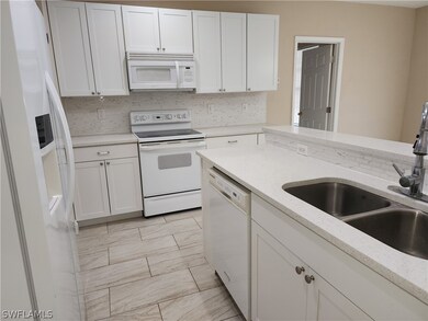 1237 Ermine St E, Lehigh Acres, FL 33974 - photo 4