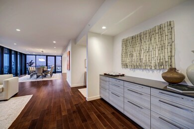 The Formal Living Room features this built-in dry bar with Poggenpohl cabinetry and silestone counter.