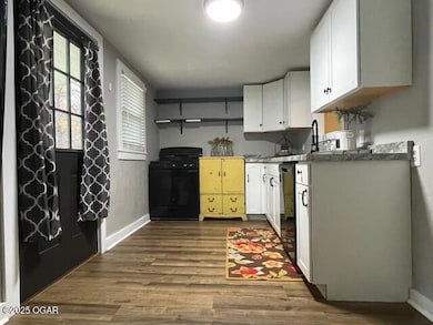 522 N Kentucky St, Carterville, MO 64835 - photo 7