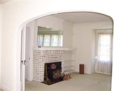 Living Room Living  Room has wood-burning stove in