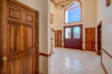 Grand 2 Story Foyer w/Turned Staircase, Elegant Chandelier, 2 Closets!