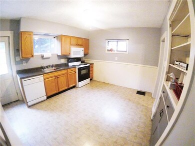The expansive eat-in kitchen is the perfect settin