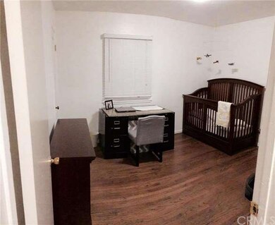 Bedroom #2 has original hardwood floors and been f