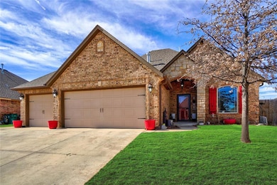 View of front of house with a garage and a front l