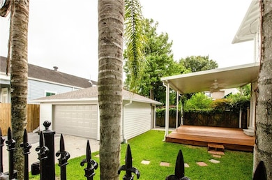 Two Car garage with automatic garage door and gate