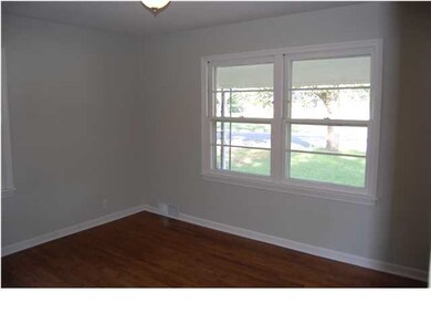 MASTER BEDROOM WITH WOOD FLOORS