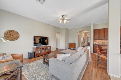 Family room has great flow and views to the kitchen area with additional seating available at the bar!