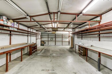 Well lit and plenty of shelves or storage of tools