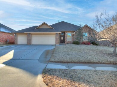Single story home with a garage