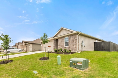Ranch-style house with concrete driveway, a front