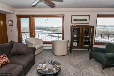 New Anderson wood frame windows and balcony doors