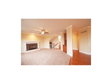 1 of 2 Family Rooms with Fireplace and Built-ins.