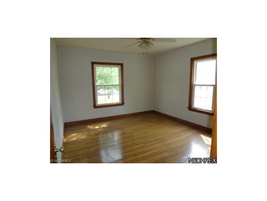Bedroom 1 Main floor with hardwood floor