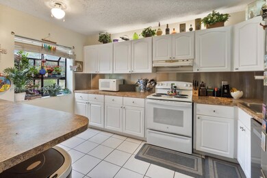 3705 Carambola Cir N unit 2834, Coconut Creek, FL 33066 - photo 6