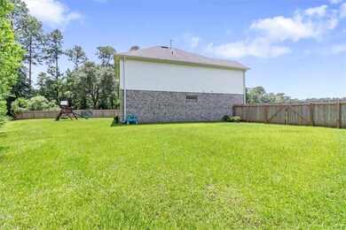Yard is huge and offers a double gate for rear yard access