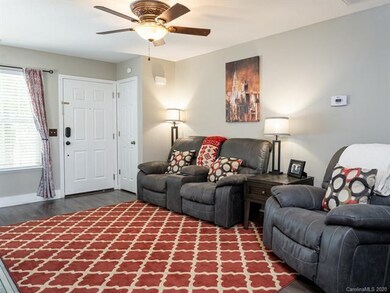 Living room features the new floors found througho