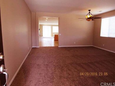 View of Living Room, Dining Room and Open Kitchen from Front Door