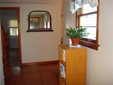 Hallway from living room to 1st floor bedroom, bat