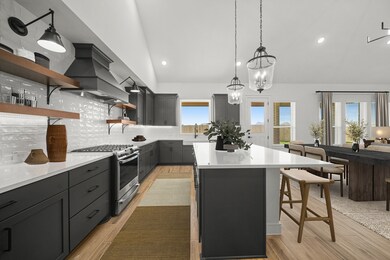 Kitchen with pendant lighting & floating shelves