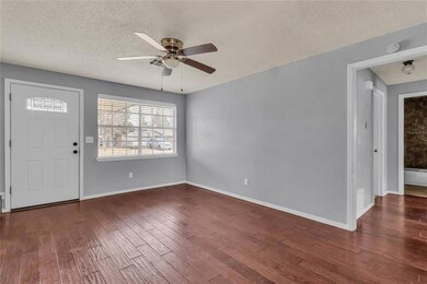 Unfurnished room featuring dark hardwood / wood-st