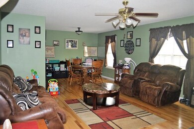 Lots of natural light with the oversize double window. Don't miss the gorgeous hardwood floor.