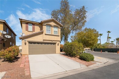 Traditional home with concrete driveway, a tiled r