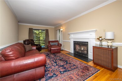 Great Room with fireplace and wood floors