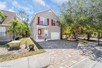 View of front of property with decorative driveway