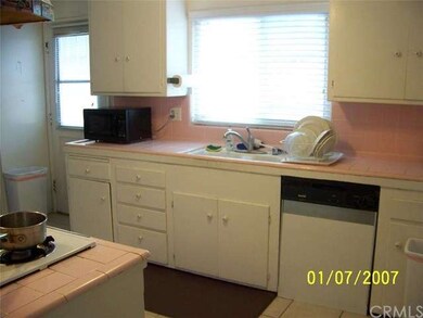 Next comes the kitchen just off the entry hallway.