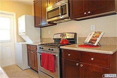 Gas Oven and Built-in Microwave w/ Stacked washer 