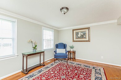 Living Room features Hardwood Floors and freshly p