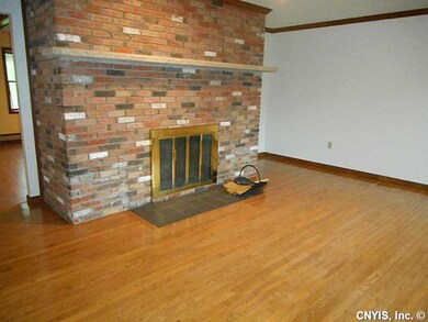 Dining Room. Wood-burning fireplace in dining room