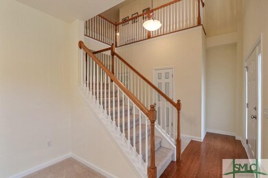 The stair case leading to the second level is loca