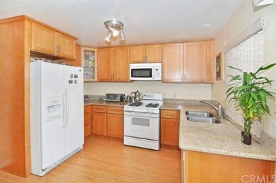 Highly renovated kitchen includes upgraded counter
