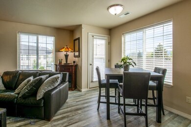 Dining area and door to private balcony.