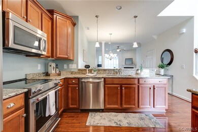 Open Concept Kitchen Overlooking Dining Room and F