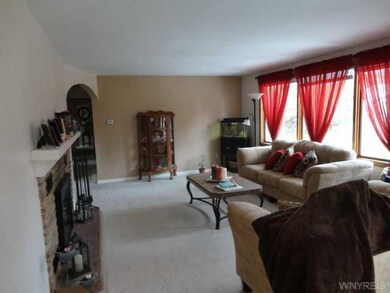 Living Room As seen from the kitchen entrance to t