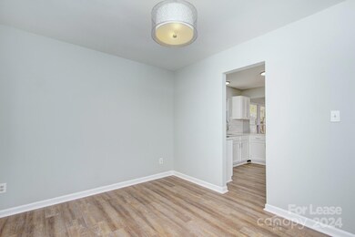 Dining room featuring new lighting