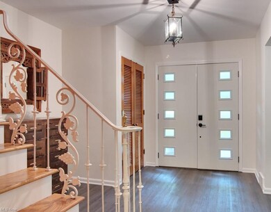 Foyer. Original wrought iron decorative railing on