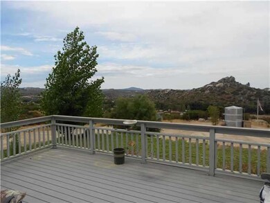 NICE PATIO IN FRONT OF HOME WITH VIEWS OF THE MOUN
