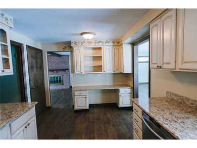 Kitchen. Great cabinetry with built in desk area.