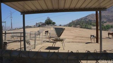 Pasture and one of the covered areas for animals
